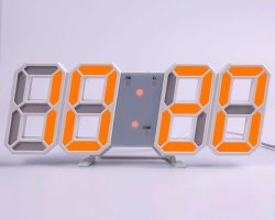 عکس ساعت دیجیتال سه بعدی رومیزی سفید و نارنجی